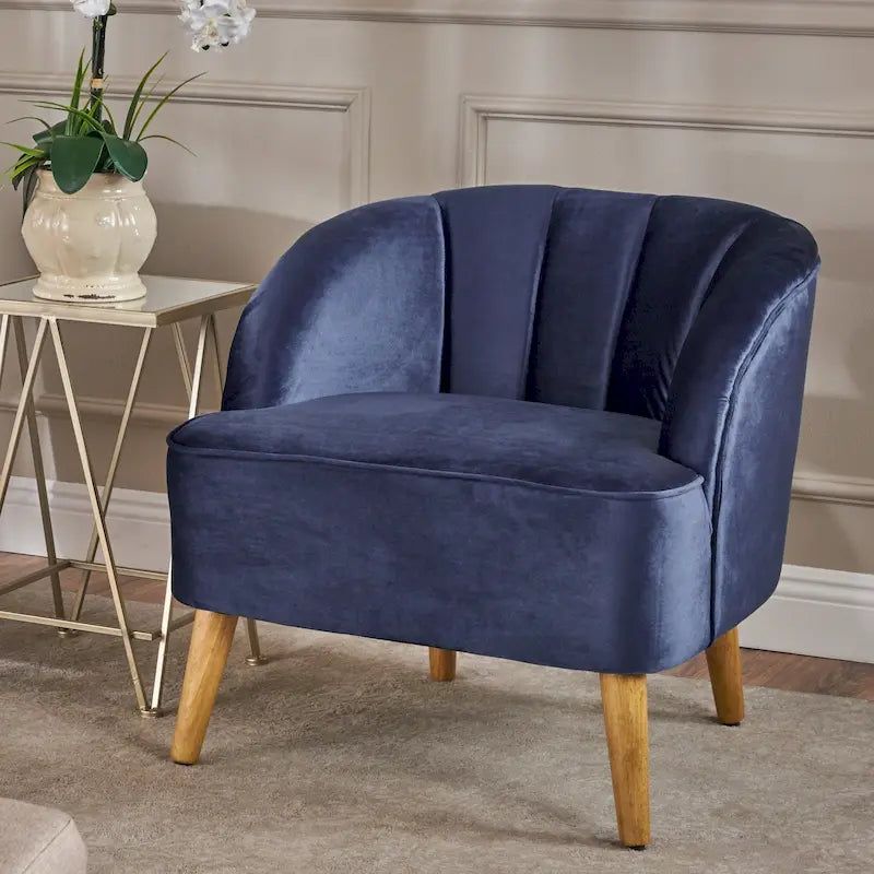 Fauteuil club moderne en velours avec pieds en bois de noyer