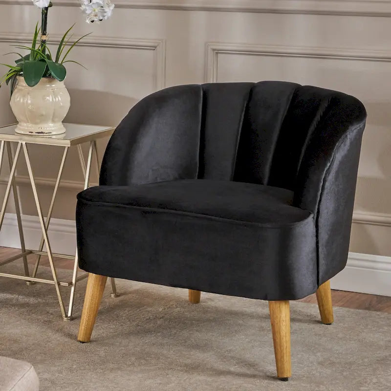 Fauteuil club moderne en velours avec pieds en bois de noyer
