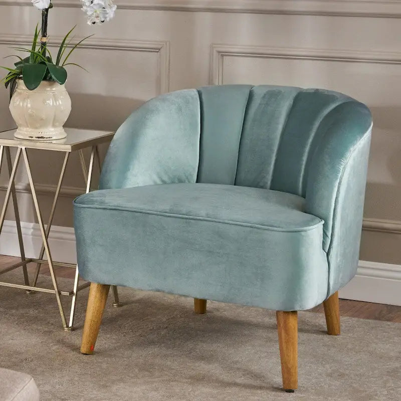 Fauteuil club moderne en velours avec pieds en bois de noyer