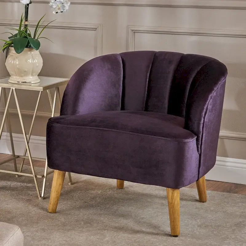 Fauteuil club moderne en velours avec pieds en bois de noyer