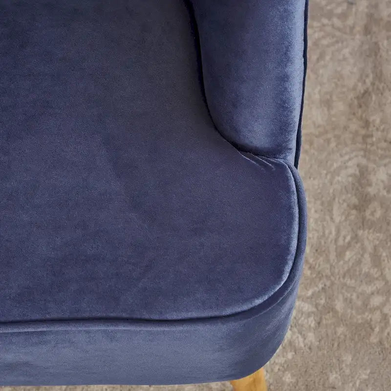 Fauteuil club moderne en velours avec pieds en bois de noyer