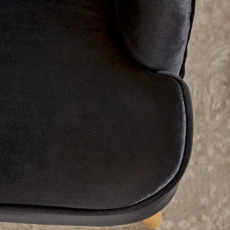 Fauteuil club moderne en velours avec pieds en bois de noyer