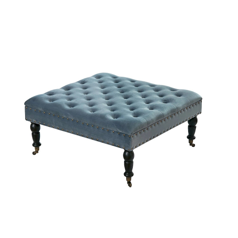 Ottoman de table basse capitonné avec garniture cloutée et roulettes